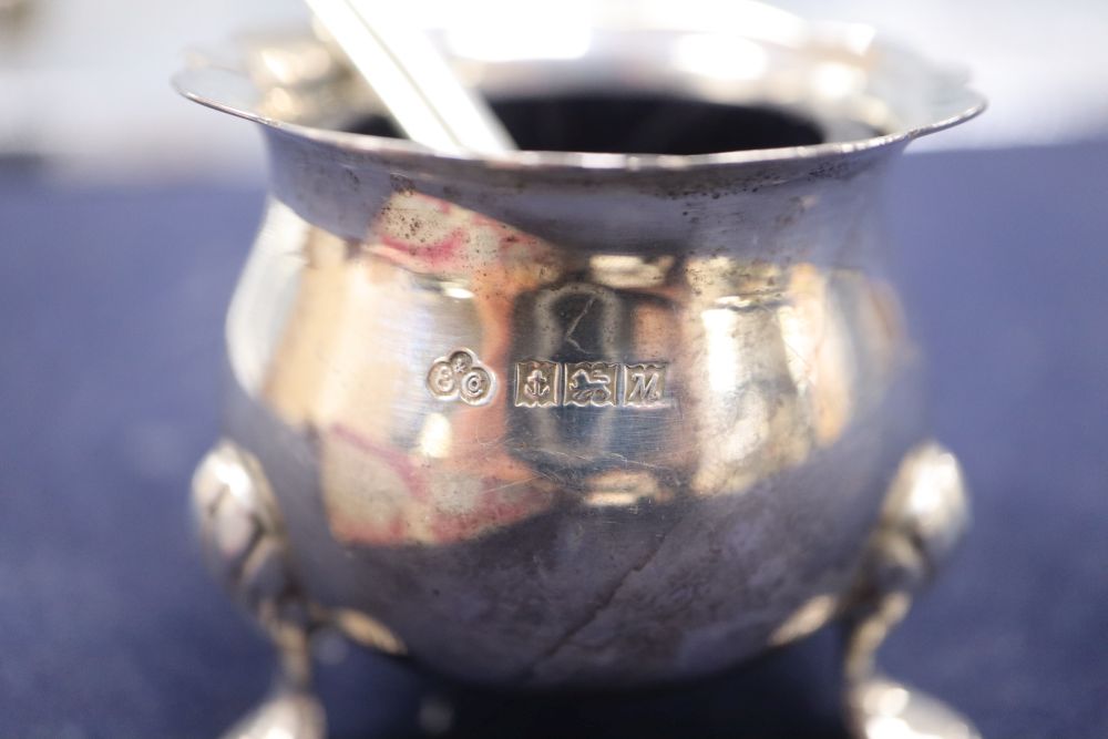 A modern silver three piece condiment set by Elkington & Co, one other silver condiment and silver topped shaker